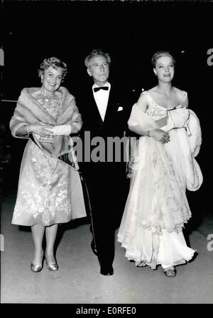 May 05, 1959 - Cannes Film Festival. Jean Cocteau photographed with Romy Schneider and her mother arriving at the festival. Stock Photo