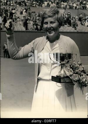 May 05, 1959 - Christine Truman Wins Again: 18 Year-Old English Tennis Star Christine Truman Won The Ladies' Final By Beating Her Hungarian Opponent Susie Kormoczi, At In The Paris International Championship At Roland Garros Today. Photo shows Christine Truman Holding Her Cup Smiling Happily. Stock Photo