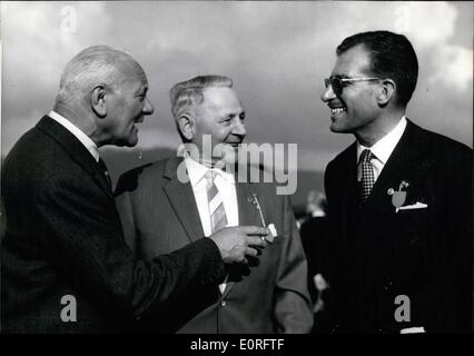 May 05, 1959 - Meeting of the parachute descents in Freiburg: From Mai the 16th till the 19th the 6th meeting of the league of German parachute descents in Freiburg took place. It was the first time that parachute descents from Italy, France, America and Spain took part of this event. On Mai the 16th former senior general Student (STUDENT) opened the searching service exhibition and on Mai the 17th the parachute descents assembled on the airport of Freiburg. Photo shows from left to right General Quarone (QUARONE) Italy, General Ramke (RAMKE) and Lieutenant Munos Grande (Munos Grande) Stock Photo