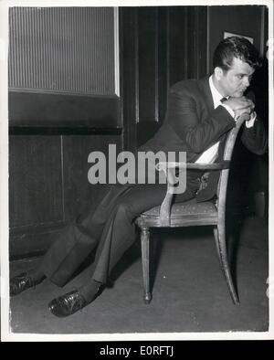 May 05, 1959 - Conway Twitty arrives in London. Prepares for TV's 'Oh Boy' show.: Conway Twitty arrived in London this afternoon to take part in Commercial TV's ''Oh Boy'' show on Saturday. Photo shows Conway Twitty who had little rest in the past four days - owing to traveling - takes it easy during the press reception at the Society Restaurant this afternoon. Stock Photo