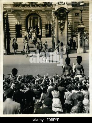 Jun. 06, 1959 - Trooping The Colour Ceremony. H.M. The Queen took the salute in Horse Guards Parade at Trooping the Colour ceremony, held to mark her official birthday. Photo Shows:- The scene as H.M. The Queen, seen saluting, left Buckingham Palace on her way to the ceremony. Stock Photo