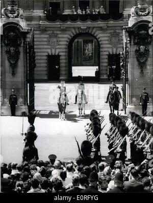 Jun. 06, 1959 - Trooping The Colour Ceremony.: H. M. The Queen today took the salute on Horse Guards Parade, at the trooping the colour ceremony, held to Mark her official birthday. Photo shows watched by other members of the Royal Family from a balcony of Buckingham Palace, H. M. The Queen takes the salute at the march past, on her return from the trooping ceremony. Stock Photo