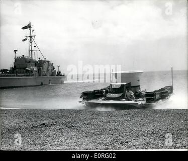 Jun. 06, 1959 - Britain's ''Flying Saucer'' Takes Part in Airborne and Seaborne Landing Demonstration... The Saunders Roe Hovercraft to day took part in the three services demonstration ''Runaground X'' at Eastney, Portsmouth - The demonstration is designed to show staff College students some of the problem of amphibious operations... The hovercraft flew from Cowes, I.O.W. for the demonstration. Keystone Photo Shows: with landing craft in the background - the Hovercraft prepares to land on the beach at Eastney, today. Stock Photo