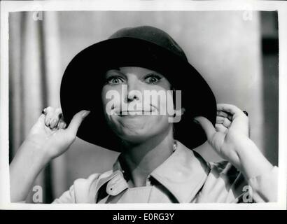 Aug. 08, 1959 - Dawn Addams Rehearses for First BBC TV Play. Actress Dawn Addams was to be seen at the Riverside Studios this morning rehearsing for her part in ''The Millionaires: - her first BBC TV Play - to be shown on Sunday Sept. 6th. Keystone Photo Shows: Dawn Addams makes a grimace at the camera - as she wears a man's hat - as she appears in the play today. Stock Photo