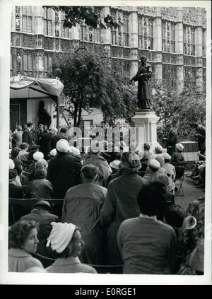 Jul. 07, 1959 - New memorial to Dame Christable Pankhurst Unveiled. A new memorial to Dame Christable Pankhurst which has been added to the statue of her mother Mrs. Emmeline Pankhurst, was unveiled this morning at the Victoria Gardens, near the House of Lords. Photo Shows General view during the unveiling ceremony - performed by Lord kiluir - in Victoria Garden this morning. Stock Photo