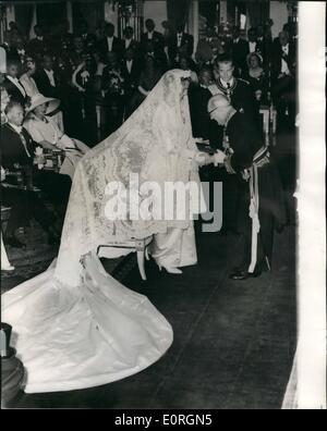 Jul. 07, 1959 - Prince Albert Weds Princess Paola: Prince Albert of Liege, hair prosumptive to the Belgain throne, was married in Brussels today to Italian Princess Paola Ruffo di Calabria. A civil ceremony in the Empire Room of the Royal Palace proceded the religious ceremony in the church of St.Michael and St. Gud ule. Photo show the scene during the civil ceremony in the Royal Palace today showing the Burgomeaster congratulating the bride. Prince Albert stands on her left and behind are seen ex-King Leopold and the Princess de Rethy Stock Photo