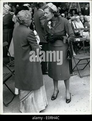 Jul. 07, 1959 - New Memorial to Dame Christabel Pankhurst Unveiled: A new memorial to Dame Christabel Pankhurst which has been added to the statue of her mother Mrs. Emmeline Pankhurst, was unveiled this morning at Victoria Gardens, near House of Lords. Photo Shows Lady Mountbatten speaks to Mrs. Pandit the high Commissioner for India - at the ceremony today. Stock Photo