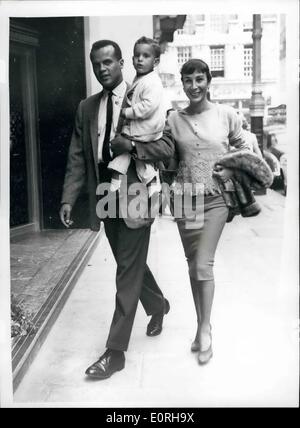 Sep. 09, 1959 - Harry Belafonte and his Family In London: American actor- Singer Harry Belafonte with his wife Julie and their Son David were to be seen in London this afternoon. He is to appear on BBC TV on September 20th. Picture Shows: Harry Belafonte and family on arrival at the May fair Hotel today. Stock Photo