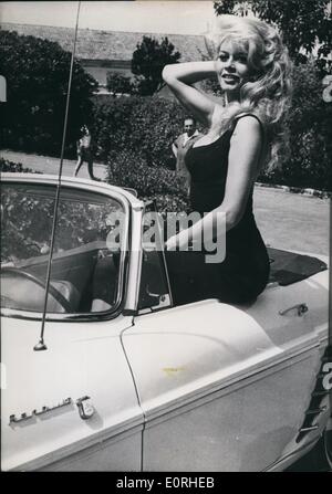 Aug. 08, 1959 - Brigitte Bardot seems mighty proud of her new car