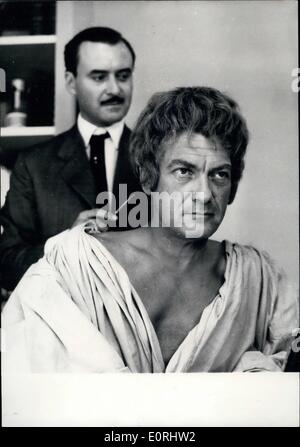 Sep. 09, 1959 - New Wig For King Oedipus (Jean Marais) Jean Marais, the famous French screen actor who is to impersonate King Oedipus in Cocteau's new version of ''Orpheus'' tried on the wig he will be wearing in his new role. OPS: Jean Marais trying on the new wig made by the famous Paris hairdresser Alexandre. Stock Photo