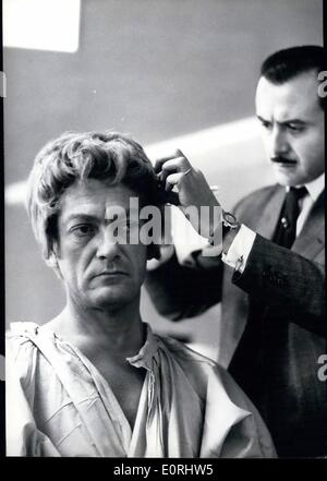 Sep. 09, 1959 - Jean Marais As King Oedipus Jean Marais, the famous French stage and screen actor, will impersonate King Oedipus in Jean Cocteau's new film of ''The Will of Orpheus''. OPS: Alexandre, the famous Paris hairdresser, trying on Jean Marais the wig the actor will be wearing in his new role. Stock Photo