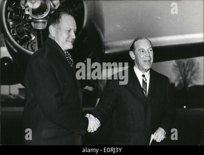 Nov. 11, 1959 - Secretary of States, Dillon arrived at Bonn. On his tour to London, Brussels, Paris and Bonn, the American Secretary of States, Dillon arrived on Friday, 11.12.59 at the airodrome Koln - Wahn. Dillon, who will speak with chancellor Dr. Adenauer, the Minister of Economics Prof. Erhard and foreign - minister Cr. Heinrich von Brentano was received in the airodrome by the new ambassador of Amerika, Walter C. Dowling. PC: Secretary of States Dillon - left - was welcomed by ambassador Walter C. Dowling - on the right- Stock Photo