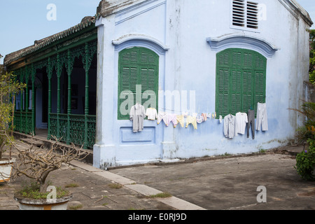 Clothes hanging out to dry on washing line in Hoi An Stock Photo