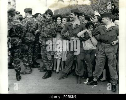 Jan. 01, 1960 - Revolt In Algiers OPS: Young Paratroopers fraternising with the insurgents with a bunch of laughing girls in the middle. A scene during the supporters' demonstration yesterday. Stock Photo