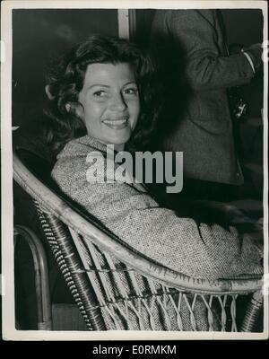 Jan 1, 1960 - Aly Khan meets Rita Hayworth on her arrival in Paris : Film actress Rita Hayworth was hardly in Paris an hour last night before ex-husband Aly Khan was calling on her at her &pound;25-a-day suite at the Ritz. She had arrived from new York earlier with her daughters, six-year-old Yaamin, and Rebecca, the ten-year-old daughter of her marriage to Orsen Wells. She has come to Paris to lot her daughter Yasmin live with ''(Illegible)''. Photo shows Rita Hayworth seen in Cherbourg yesterday after her arrival. Stock Photo