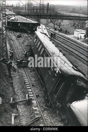 Mar. 03, 1960 - Investigators Into Paris-Cannes Ex Train Crash Think Derailment Result of Sabotage Police inspectors and officials investigating into the Paris-Cannes train crash hold the opinion that the derailment might have resulted from an act of sabotage. OPS: An aerial view of the overturned cars near Lyons. Stock Photo