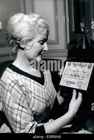 Mar. 11, 1960 - Ex-Model gets award of 1,194 - ''Million Pound Note'' - mystifies the Bank of England.. Mrs. Veila Roberts, blonde ex-model Veila Dawes was yesterday awarded 1,194 against the estate of her ''benefactor'' - Mr. Frederick Roberts (72), as a result of injuries which she received in a car crash - in which Mr. Roberts lost his life. Mrs. Roberts (she changed her name by deed poll) and Mr. Roberts were to have married - after the former had divorced her husband - but the decree was rescinded by the Queen's Proctor.. The couple lived together until Mr. Roberts death. Stock Photo
