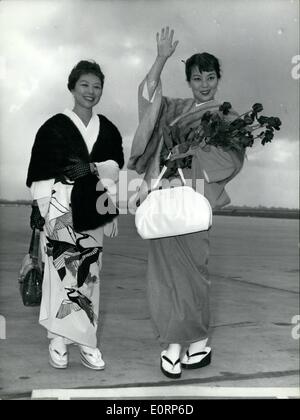 Apr. 04, 1960 - Bound For Cannes: Machiko Kyo Arrives in Paris Machikyo, The Famous Japanese Screen Actress, Arived at Only Airfield On Her Way to Cannes Where She Will Attend the Annual Film Festival. Ops: Machiko KYO (Rights Pictures at Only Airfield. NEXT tO HER IS hER sECERTARY iNTERPRETER MISS NIRCKO OGAVA. Stock Photo