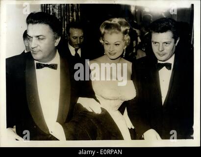 Feb. 08, 1960 - Anita Ekberg At Film Premiere: Anita Ekberg attended the premiere in Rome of the film ''Dolca Vita'' (Sweet Life), in which she stars with Marcello Mastroianni (*right). On left is the director of the film Fedrico Fellini. Stock Photo