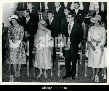 May 05, 1960 - Baptism of Prince Philippe - Son of Prince Albert And Princess Paola - of The Belgians. Scene during the ceremony at the Church of St. Jacques, Goudenberg, Brussels - of Prince Philippe the baby son of Prince Albert and Princess Paola of the Belgians. Watching the ceremony are L-R:- Princess Josephine Charlotte; Queen Mother Elizabeth; King Baudouin; Princess Liliane and the young Princess Esmeralada. Stock Photo