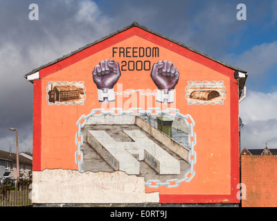 Mural wall painting of notorious H Block prison on side of house in Belfast, Northern Ireland Stock Photo