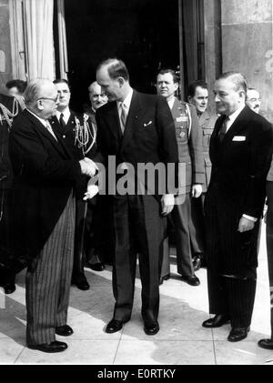 Politician C. Douglas Dillon shakes hands with colleague Stock Photo