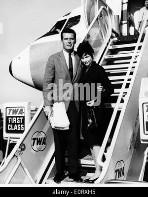 Actor James Garner and wife Lois Clarke boarding an airplane Stock Photo
