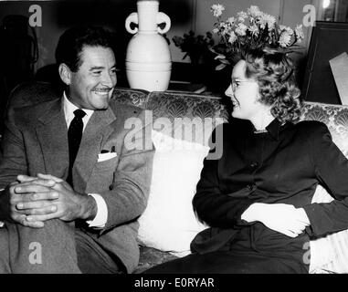 Actor Errol Flynn talks with reporter Stock Photo