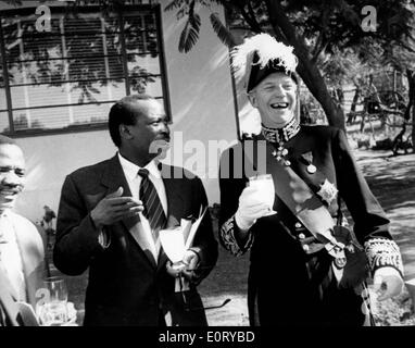 First president of Botswana SERETSE KHAMA, left, jokes with a man in uniform. Stock Photo