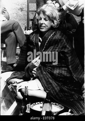 First Lady Claude Pompidou wrapped in a blanket Stock Photo