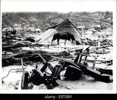 Jun. 04, 1960 - Thousands Die In Earthquakes. Workers And Salvaged Belongings In corral: It is estimated that more than three thousand people lost their lives in the series of earthquakes which wrecked vast areas of Chile.. The earthquakes brought tidal waves and many volcanoes burst into eruption. Photo shows: Wreckage in a town - the other side of Valdivia - this town was practically wiped out. Stock Photo