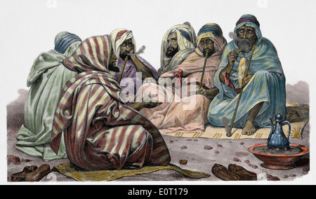 Africa. Tunisia. Tunisian men, c. 1850. Engraving. Colored. Stock Photo