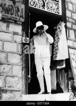 Actress Greta Garbo leaves restaurant on vacation Stock Photo