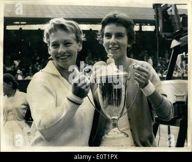 Jul. 07, 1960 - Women's Doubles Final at Wimbledon. Winners with the Trophy. Photo Shows Darlene Hard(USA) and Maria Bueno (Brazil)- with their trophy after having beaten MIss Reynolds and Miss Shuurman (South Africa)- in the Ladies Doubles Championships at Wimbledon this Afternoon. Stock Photo