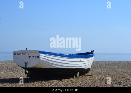 Traditional fishing boats on Aldeburgh Beach inspire artists, composers and visitors. This are permanently beached and historic boats. Stock Photo