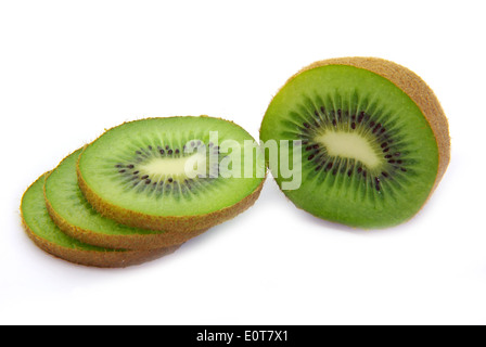 Freshly cut kiwi fruit on white background. Stock Photo