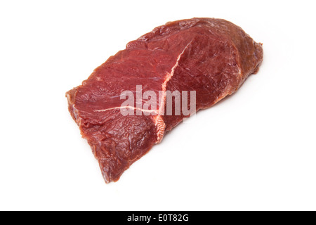 Fresh horse meat steak isolated on a white studio background. Stock Photo