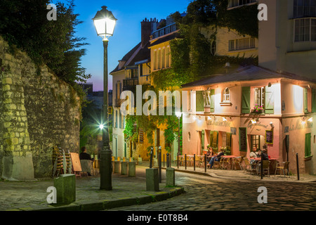 Twilight at La Maison Rose Cafe in Montmartre, Paris France Stock Photo