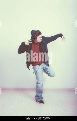Cool man with headphones dancing. Stock Photo