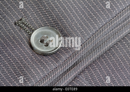 Close up pocket button on formal suit trousers Stock Photo