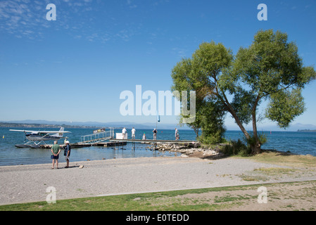 Lake Taupo tourists and float plane on the North Island New Zealand Stock Photo