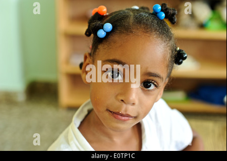 Dominican children learning in a classroom in Cabrera, next to Playa Grande, 120 km east of Puerto Plata Stock Photo