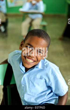 Dominican children learning in a classroom in Cabrera, next to Playa ...