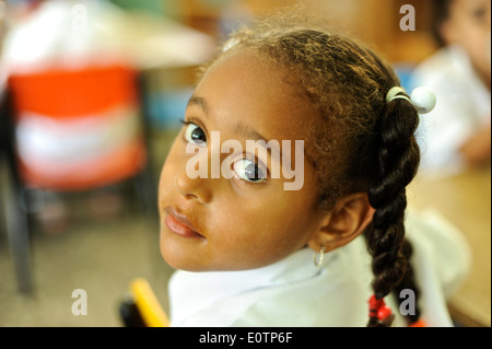 Dominican children learning in a classroom in Cabrera, next to Playa Grande, 120 km east of Puerto Plata Stock Photo