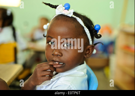 Dominican children learning in a classroom in Cabrera, next to Playa Grande, 120 km east of Puerto Plata. Stock Photo