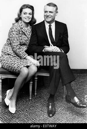 Actor Cary Grant sitting with wife Dyan Cannon Stock Photo