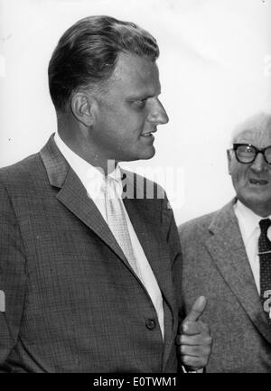 Reverend Billy Graham chats with man Stock Photo