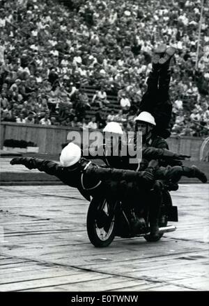 Aug. 08, 1960 - Real artists on the motor-bike: are the policemen who take part in the ''Great Police Show 1960'' on Aug. 28th in the Berlin Olympic Stadium. High-light of the show will be the performances of the policemen on motor bikes. Photo shows a figure of the performance, in full speed. Stock Photo