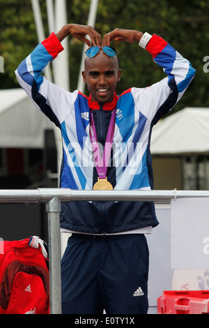 British Olympic gold medal winning Mo Farah poses for a photograph during the London 2012 Victory Parade for Team GB and Paralympic GB athletes in London Britain 10 September 2012. Stock Photo