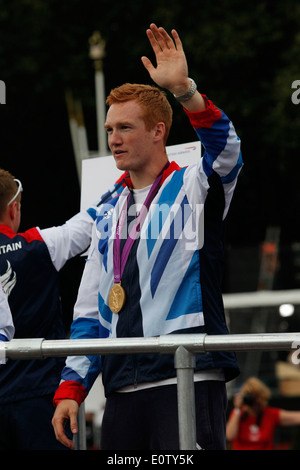 British Olympic gold medal winning athlete Greg Rutherford waves during the London 2012 Victory Parade for Team GB and Paralympic GB athletes in London Britain 10 September 2012. Stock Photo